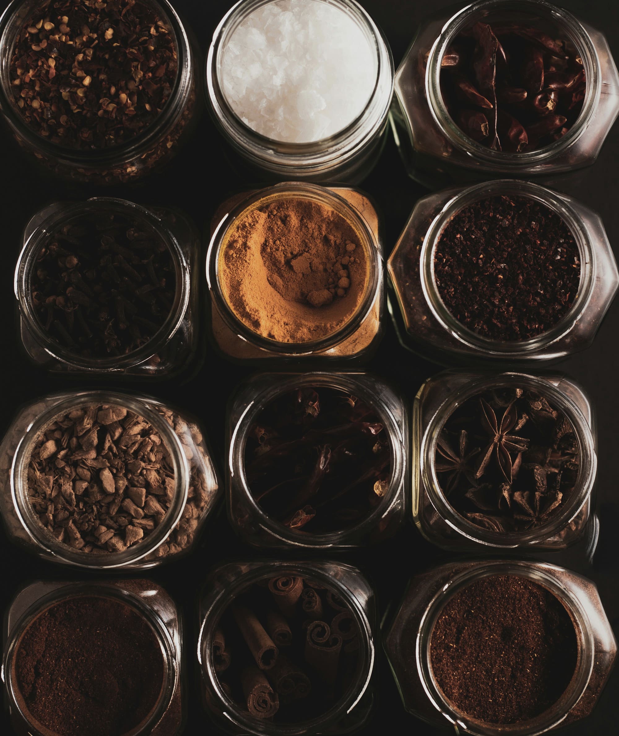 Pantry storehouse with jars of spices and sacks of pulses